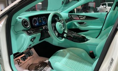 Mercedes GT Brabus white color from the inside in a car show
